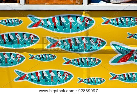 Details Of Traditional Lisbon Yellow Tram Decorated With Sardines