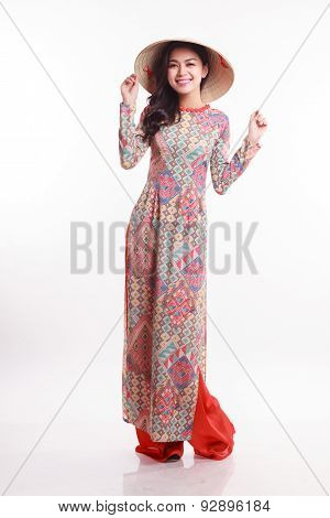 Beautiful Vietnamese Young Woman With Modern Style Ao Dai And Palm-leaf Conical Hat ( Non La ) On Wh