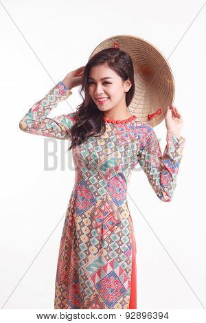 Beautiful Vietnamese Young Woman With Modern Style Ao Dai And Palm-leaf Conical Hat ( Non La ) On Wh