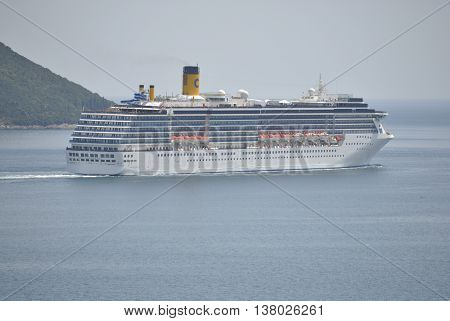 Herceg Novi, Montenegro - June 23, 2016: Costa Mediterranea cruise ship in Boka Bay, Montenegro. Costa Mediterranea is was constructed  in Helsinki, Finland.