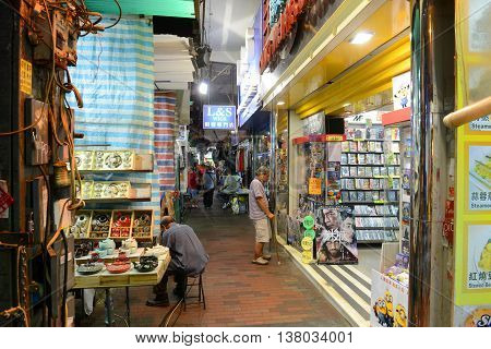 HONG KONG - NOV 9: Hong Kong Temple Street at night on Nov 9, 2015 in Kowloon, Hong Kong. Temple Street is famous for its night market and busiest flea markets at night in Hong Kong.