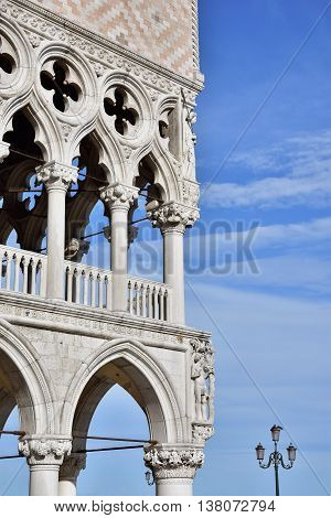 Doge Palace corner with gothic gallery and beautiful sky