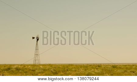 A lonely windmill on the high plains of Eastern New Mexico.
