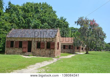 CHARLESTON SOUTH CAROLINA JUNE 28 2016: Slave cabins in Boone Hall Plantation in Mount Pleasant, the slave houses are insightful, and the Gullah Culture explanation is informative