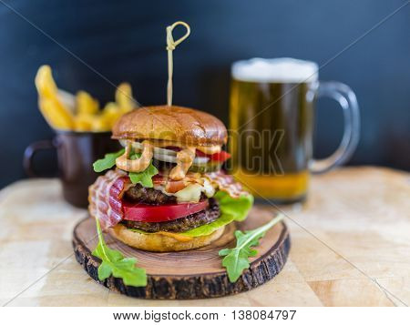 Tasty street food grilled double beef burger in crispy shortbread with lettuce and mayonnaise
