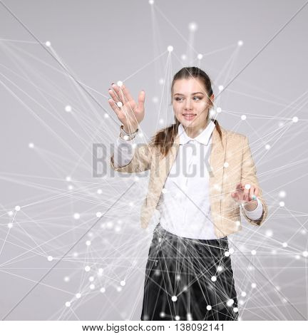 Worldwide network or wireless internet connection futuristic concept. Woman working with linked dots.