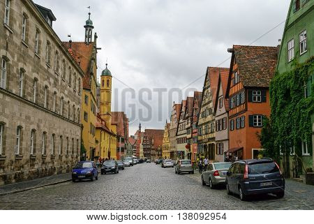 Dinkelsbuhl, Germany - August 28, 2010: Street view of Dinkelsbuhl one of the archetypal towns on the German Romantic Road.