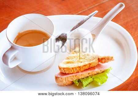 Coffee with dumplings in coconut cream sandwich balogna sausage