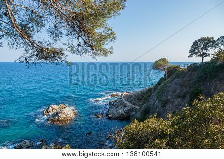 View over the cliffs and the coastal footpath at Lloret de Mar Costa Brava Catalonia Spain.