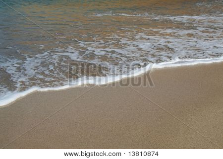 Welle am Strand