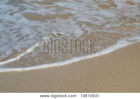 Welle am Strand