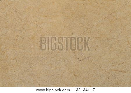 Brown old paper background. Thick cardboard. Paper texture
