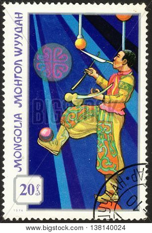 MOSCOW RUSSIA - DECEMBER 2015: a post stamp printed in MONGOLIA shows a juggler the series 