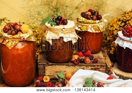Homemade Strawberry Pits. Dessert Made Of Must And Flour Placed Inside Small Jars. Homemade Raspberr