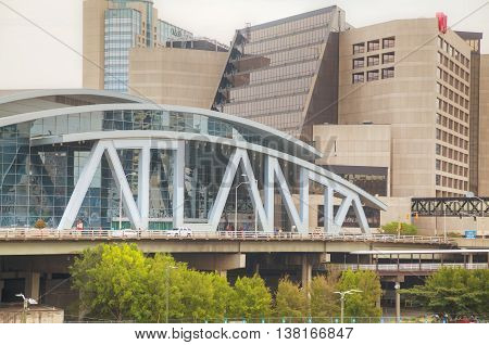 ATLANTA - AUGUST 29: Philips Arena and CNN Center on August 29 2015 in Atlanta GA. Philips Arena is a multi-purpose indoor arena. It was completed and opened in 1999 to replace The Omni.