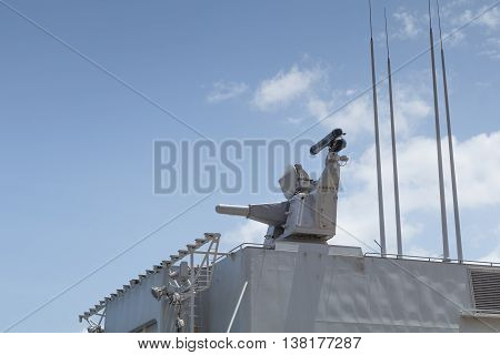 CIWS close in weapon system mounted on Dutch Naval Frigate under clear blue sunny skies Malta June 2016