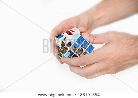 Man trying to solve cube travel puzzle where to go