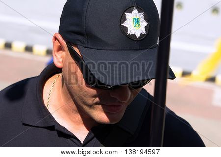 Odesa, Ukraine - July 03, 2016: Portrait of Plice officer preparing to meet the President of Ukraine Petro Poroshenko during celebration of NAVY day in Odesa