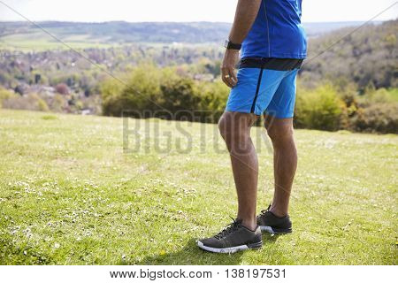 Close Up Of Mature Man Jogging In Countryside