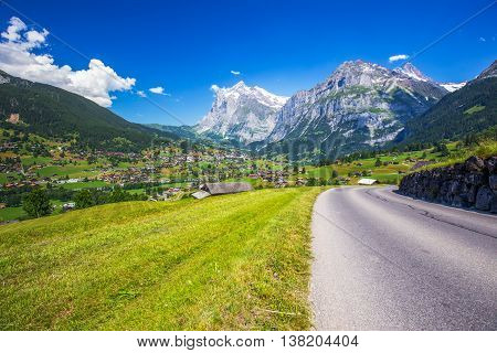 View To Famous Grindelwald Valley, Green Forest, Alps Chalets And Swiss Alps (schreckhorn, Berglisto