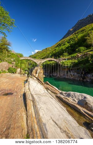 Double Arch Stone Bridge At Ponte Dei Salti With Waterfall, Lavertezzo, Verzascatal, Canton Tessin.