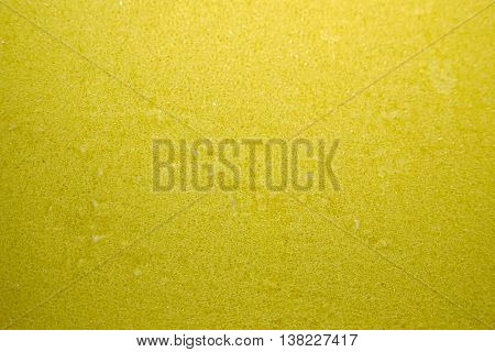 Yellow sponge with green scrubber - isolated