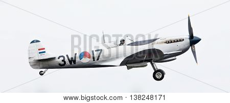 Leeuwarden, The Netherlands - June 10, 2016: A Vintage Spitfire Fighter Plane Makes A Low Flypast Fo