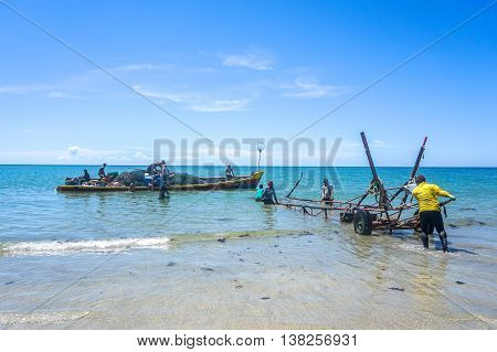 Labuan,Malaysia-Aug 29,2015:Labuan traditional fisherman returning from the sea after fishing activity at Labuan tropical island.Fishing is one of the main occupations of local people in Labuan island.