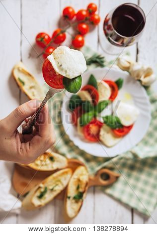 Italian traditional salad caprese and bruschetta antipasta