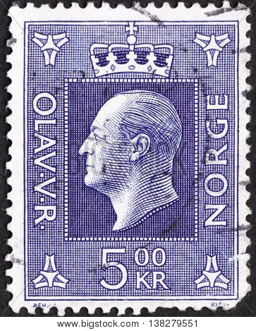 MOSCOW RUSSIA - JANUARY 2016: a post stamp printed in NORWAY shows a portrait of King Olav V the series 