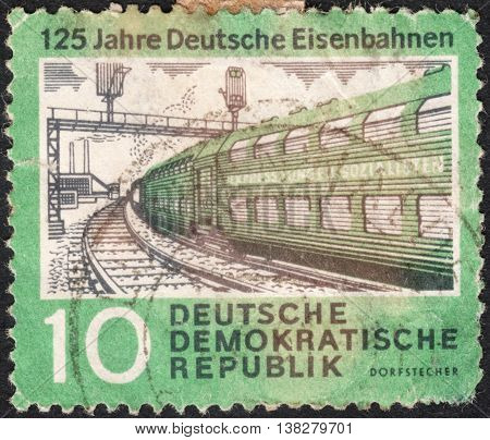 MOSCOW RUSSIA - CIRCA JANUARY 2016: a post stamp printed in DDR shows a train the series "The 125th Anniversary of Rail Roads" circa 1960
