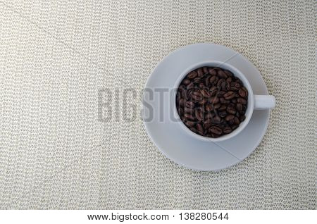 Coffee Beans In A Cup.