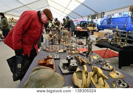 KAUNAS, LITHUANIA - MAR 23: Unidentified people in a traditional flea market in second biggest Lithuanian city - Kaunas, on March 23, 2013 in Kaunas, Lithuania