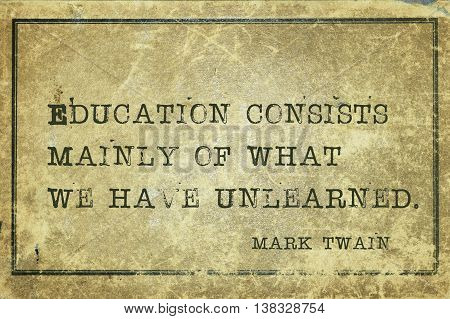 Education consists mainly of what we have unlearned - famous American writer Mark Twain quote printed on grunge vintage cardboard