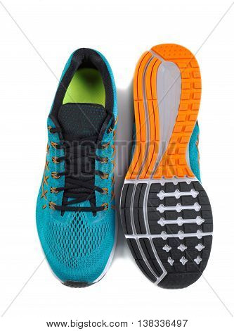 Bkue pair of sports shoes. Isolate on white.