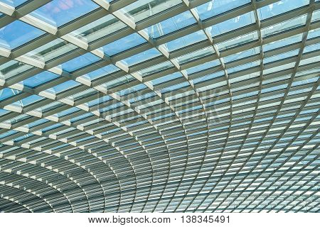 Abstract steel structure curved frame with glass facade - can use for background in architectural element or construction industry concept