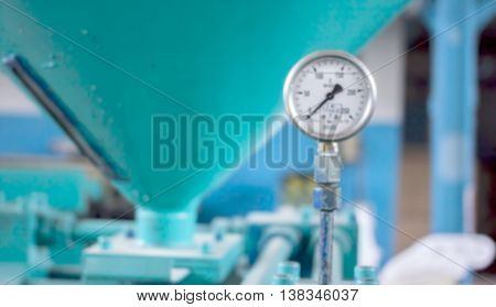 blurred cloack face on molding machine can be as background