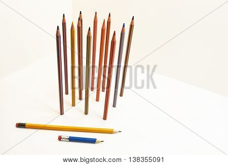 Colored pencils located vertically. Isolated on white background.