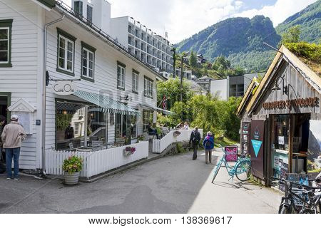 GERANGER, NORWAY - JUNE 29: Tourists walking through the streets of Geiranger on June 29, 2016 in Geiranger, Norway. Geiranger is UNESCO heritage site.