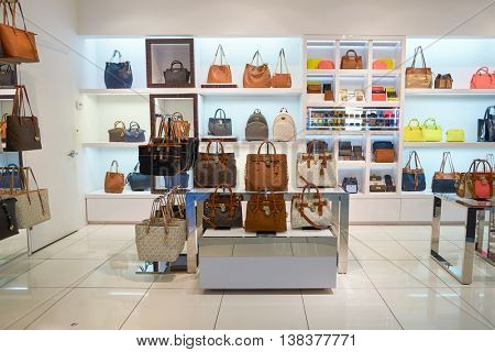 NEW YORK - APRIL 06, 2016: Michael Kors store in JFK Airport. Michael Kors Holdings is an American luxury fashion company established in 1981 by designer Michael Kors.