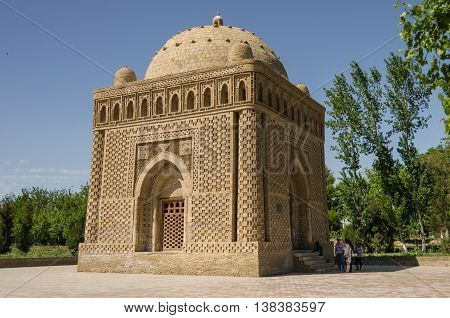 The Samanid Mausoleum In The Park, Bukhara, Uzbekistan. Unesco World Heritage