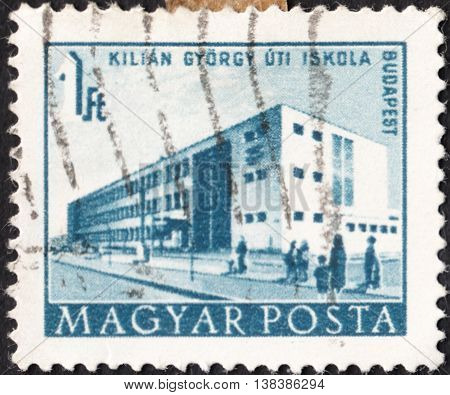 MOSCOW RUSSIA - JANUARY 2016: a post stamp printed in HUNGARY shows the Gyorgy Kilian Street School Budapest the series "Buildings" circa 1951
