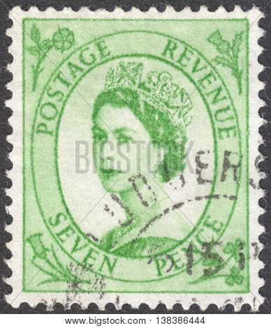 MOSCOW RUSSIA - JANUARY 2016: a post stamp printed in the UNITED KINDOM shows a Portrait of Queen Elizabeth II circa 1952