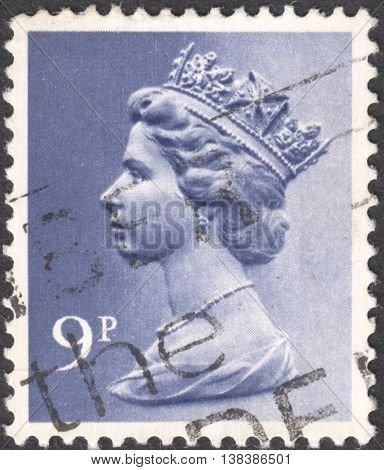 MOSCOW RUSSIA - JANUARY 2016: a post stamp printed in the UNITED KINDOM shows a portrait of Portrait of Queen Elizabeth II circa 1970 - 1977