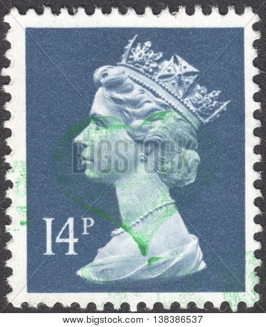 MOSCOW RUSSIA - JANUARY 2016: a post stamp printed in the UNITED KINDOM shows a portrait of Portrait of Queen Elizabeth II circa 1970 - 1977