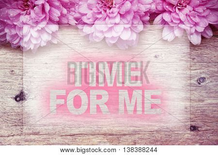 pink flowers on wooden with word TIME FOR ME