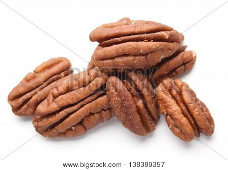 Brown pecans (carya illinoinensis) isolated on white background
