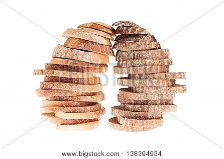 Two pile of slices of black rye bread and white bread with a crispy crust on a white background. Isolated. Concept art. Food background.