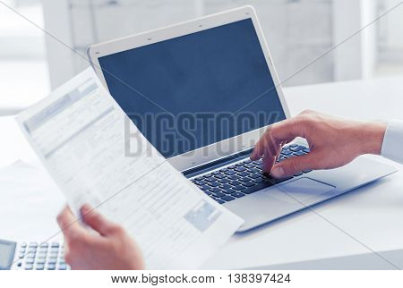 business, office, school and education concept - smiling businessman working in office