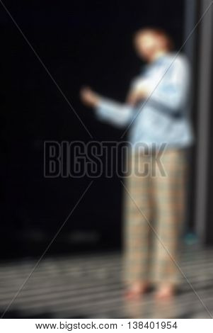 Contemporary dance performance abstract blur background with shallow depth of field
